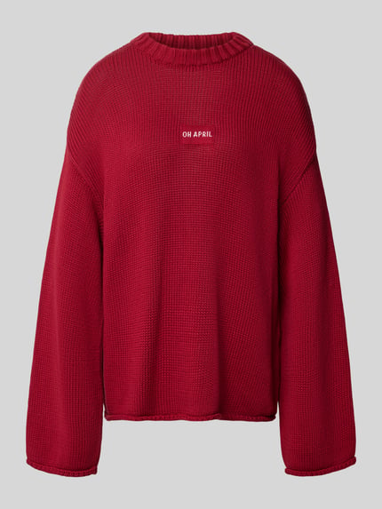 Produktfoto, Oversized Strickpullover mit Label-Detail Modell 'Fitzi' von OH APRIL, reine Baumwolle, Rundhalsausschnitt, rote Struktur