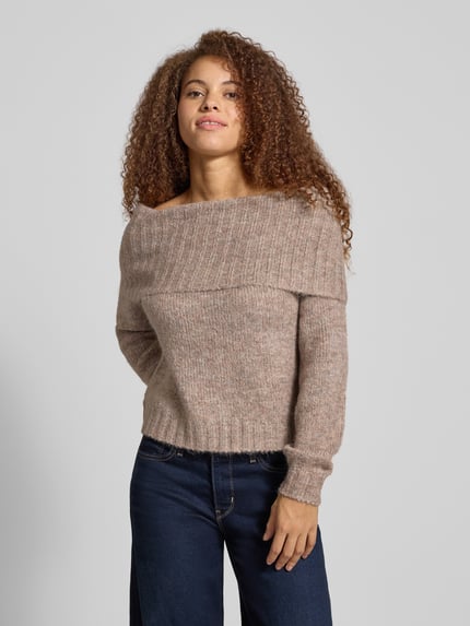 Kobiece modelka nosi Regular Fit Strickpullover mit Woll-Anteil Modell 'SHINE' od Only, melanżowy sweter z długim rękawem, dzianina, żebrowane brzegi, widok całej sylwetki z przodu.