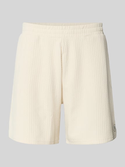 Produktfoto, Shorts mit Strukturmuster und elastischem Bund von REVIEW in Creme mit Regular-Fit, aus Material-Mix mit Stretch-Anteil.