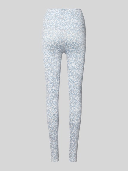Produktfoto, Slim Fit Leggins mit breitem Bund Modell 'Freesoft' von VARLEY, elastischer Material-Mix, hellblau-gemustert auf grauem Hintergrund.