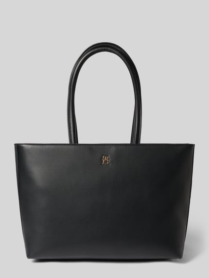Produktfoto, Shopper mit Reißverschluss und Logo-Detail von Tommy Hilfiger, schwarze glatte Oberfläche, schlichtes Design, Damen Shopper