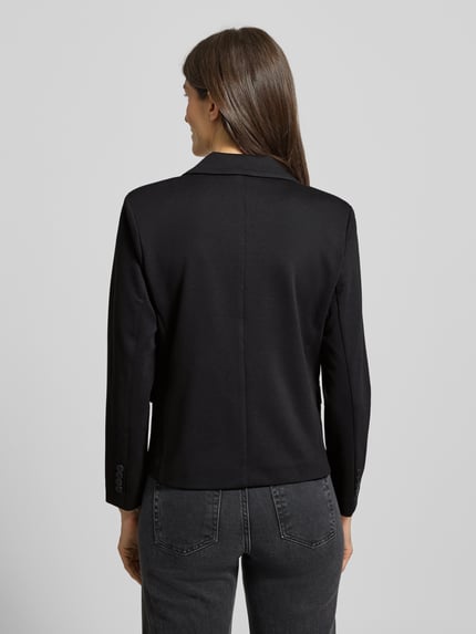 Vrouwenmodel draagt Regular Fit Blazer met Viscose-aandeel model 'Nanni' van FREE/QUENT, zwart, lange mouwen, rugaanzicht, dames blazer.