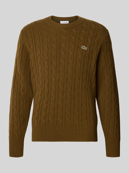 Produktfoto, Regular Fit Pullover aus reiner Wolle von Lacoste für Herren, braun mit Zopfmuster, strukturierte Oberfläche.
