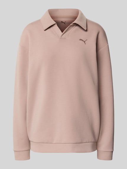 Produktfoto, Relaxed Fit Poloshirt met lyocell van PUMA, elastische materiaalmix, logodetail, polokraag, met lange mouwen, elastische boorden, effen lichtroze kleur, zachte textuur