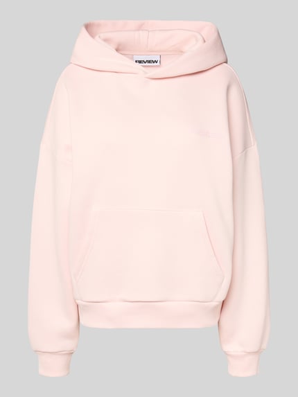 Produktfoto, Oversized Hoodie mit Kapuze von Review in zartem Rosa, Baumwoll-Mix, Label-Print, Kängurutasche, gerippte Abschlüsse