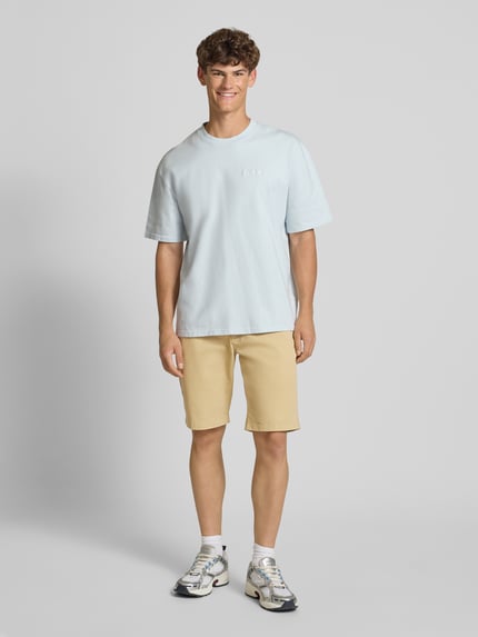 Tommy Jeans Szorty chinosy o kroju slim fit z mieszanki bawełny model ‘SCANTON’ Beżowy 1