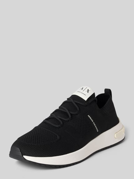 Produktfoto, Sneakersy w zakładanej przez głowę formie, model 'DUSSELDORF' od Armani Exchange, zaokrąglony czubek, detal z logo, wysokość obcasa w rozmiarze 45: 3 cm, wysokość cholewki: 6 cm, szerokość w rozmiarze 45: 8 cm, czarna siatkowana faktura, biała podeszwa