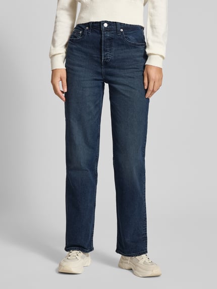 Frauenmodel trägt Slim Fit Jeans aus Baumwoll-Mix Modell 'LAYLA' von Tommy Jeans in Melange-Optik, 5-Pocket, High Waist, Ganzkörperansicht von vorne