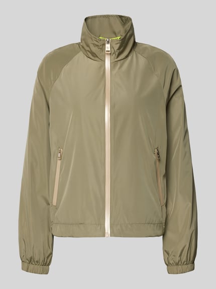 Produktfoto, Jacke mit elastischen Abschlüssen und Stehkragen von Fuchs Schmitt, khakigrün, Gerader-Schnitt, Reißverschluss, Raglanärmel, Seitliche Reißverschlusstaschen, Rückenlänge bei Größe 36: 56 cm, Schulterbreite bei Größe 36: 38 cm, Brustweite bei Größe 36: 48 cm, Ärmellänge bei Größe 36: 43 cm