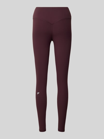 Produktfoto, dunkelrote Slim Fit Leggins mit Logo-Detail Modell 'PURELUXE' von Fabletics, glatte Stoffstruktur, Knöchellänge, Damen Leggins