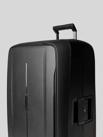 Produktfoto, Koffer mit Logo-Detail Modell 'Spinner' von Samsonite, Hardshell, schwarz, sichtbare Reißverschlüsse, strukturierte Oberfläche