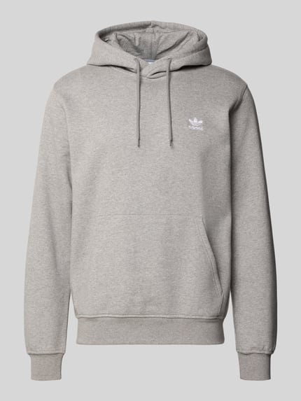 Produktfoto, Hoodie mit Kapuze von adidas Originals aus Baumwoll-Mix in Grau, Lockerer-Schnitt, Känguru-Tasche, Label-Stitching, gerippte Abschlüsse.