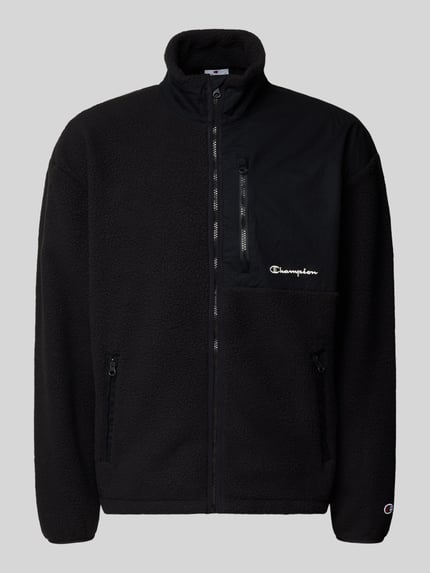 Produktfoto, Sweatjacke aus Teddyfell von CHAMPION in Schwarz, strukturierte Oberfläche, Stehkragen, Reißverschlüsse, Label-Stitching