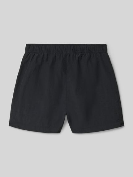 Productfoto, Badehose mit Eingrifftaschen und Logo-Print van CHAMPION voor kinderen, loose fit, elastische band met trekkoord, zij-steekzakken, logoprint, effen zwart, rechte pijpen, gladde textuur