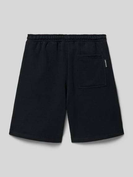 Produktfoto, Sweatshorts mit elastischem Bund und Eingrifftaschen von Jack & Jones für Kinder aus Baumwoll-Mix in Schwarz mit Gesäßtasche und Label-Detail, Regular-Fit, Bundweite 35 cm, Innenbeinlänge 23 cm bei Größe 140
