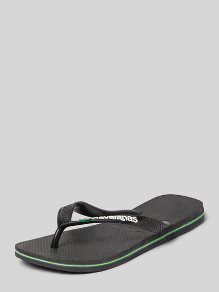Produktfoto, zwarte slippers met logodetail, afgeronde pasvorm, model 'Brasil', open hiel, hakhoogte maat 39/40: 2 cm, schachtbreedte maat 39/40: 8 cm, Slippers met logo-detail model 'Brasil' van Havaianas