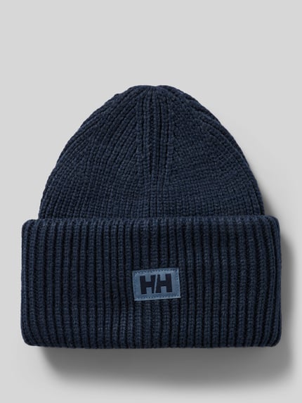 Produktfoto, Beanie in Strick-Optik mit Logo-Patch von Helly Hansen in Dunkelblau, fixierter Bund, Strukturmuster, Herren Beanie