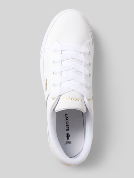 Productfoto, Low Top Sneaker uit leer-mix model 'ZIANE PLATFORM 124' van Lacoste, effen wit, afgeronde neus, plateauzool, metalen logo, geprofileerde zool, vetersluiting.