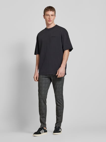 ONLY & SONS Spodnie o kroju tapered fit z dodatkiem streczu model ‘Mark’ Czarny 1
