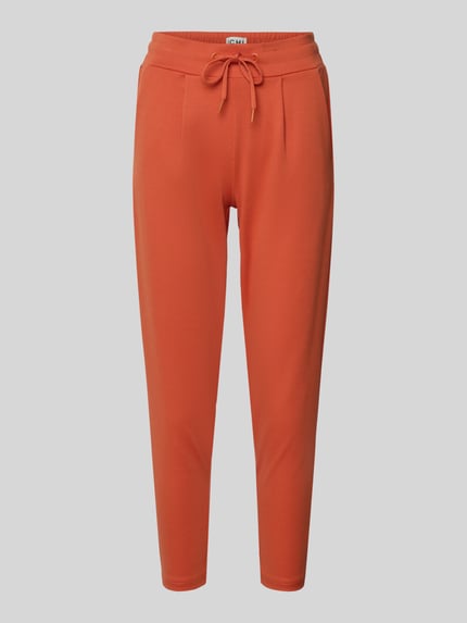 Produktfoto, Stoffhose mit elastischem Bund Modell 'KATE' von ICHI in Orange, gerader Schnitt, Tunnelzug, französische Taschen, glatte Textur