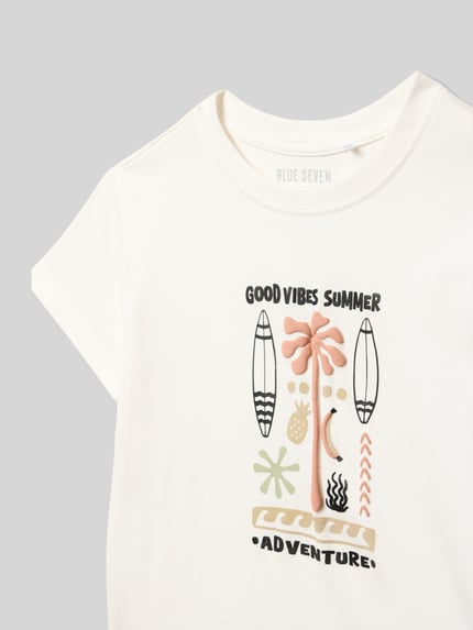 Produktfoto, Kinder T-Shirt mit Motiv-Print von Blue Seven in Offwhite, Reine Baumwolle, Regular-Fit, Rundhalsausschnitt, Rückenlänge 39 cm bei Größe 116, grafische Details in sanften Farben