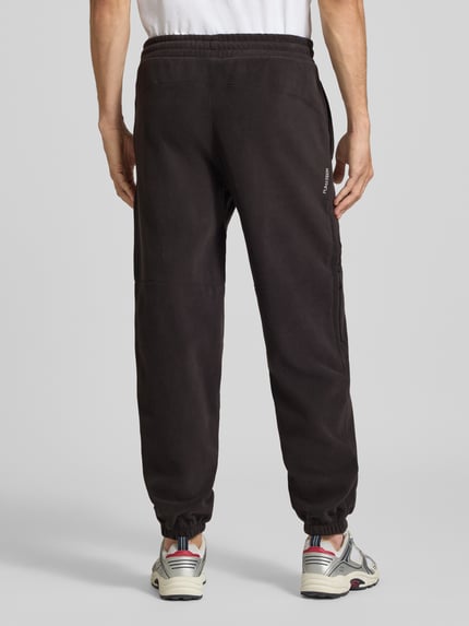 PUMA Performance Relaxed Fit Sweathose mit Logo-Print Modell 'PUMATECH' Black 5