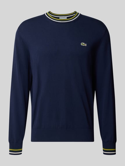 Produktfoto, Regular Fit Pullover aus reiner Wolle von Lacoste in Dunkelblau mit gelb-weiß gestreiftem Rundhalsausschnitt, Herren Pullover von Lacoste