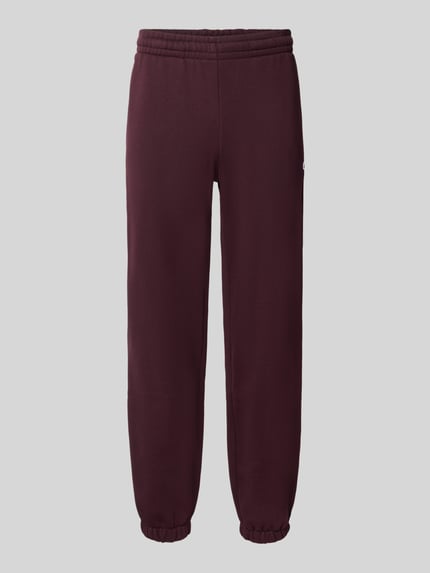 Produktfoto, dunkelrote Regular Fit Sweathose aus Baumwoll-Mix von Lacoste mit elastischem Bund und Beinabschlüssen, Herren Sweathose von Lacoste