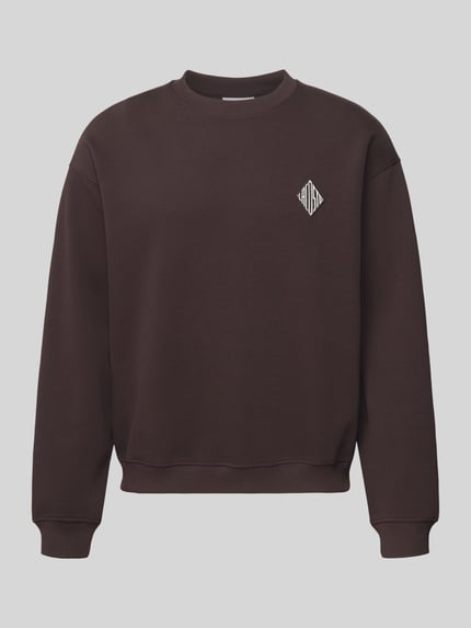 Produktfoto, Loose Fit Sweatshirt aus Baumwoll-Mix von Lacoste in Optik: Unifarben mit Logo-Stitching, Piqué Materialverarbeitung, langarm, gerippte Abschlüsse.