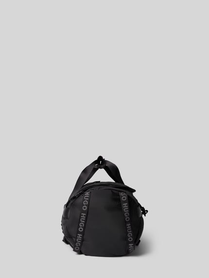 Produktfoto, czarna torba weekendowa Weekender mit Rucksackgurten model 'AYDEN_HOLDALL' od HUGO, matowa tekstura, dla mężczyzn