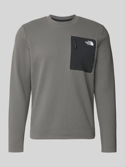 Produktfoto, Langarmshirt mit Napoleontasche Modell 'KECHA' von The North Face in Grau, elastischer Material-Mix, gerader Schnitt, Rundhalsausschnitt, Napoleontasche, Label-Detail, strukturierte Textur