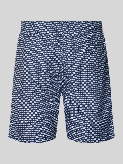 Produktfoto, spodenki kąpielowe w wzór na całej powierzchni, odcienie granatu i bieli, model 'Hammam Tile' od Shiwi, krój regular fit, elastyczny pas, tunel, moda kąpielowa