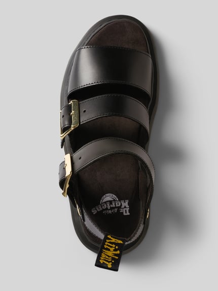 Produktfoto, Strap Sandalen aus Leder mit Dornschließen Modell 'Gryphon' von Dr. Martens, schwarz, profilierte Sohle, Label-Detail, abgerundete Form, Absatzhöhe 4 cm, Szerokość w rozmiarze 40: 8 cm