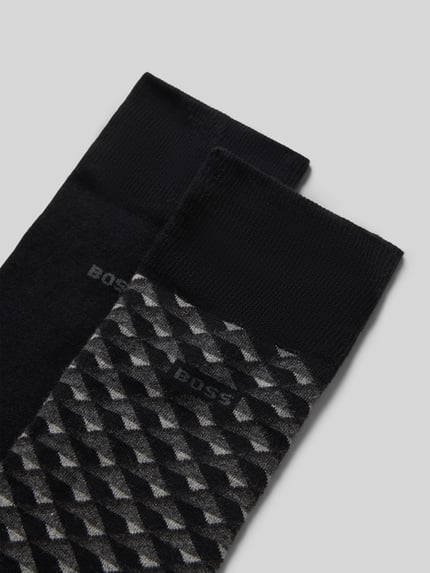 Produktfoto, Socken aus Baumwoll-Mix im 2er-Pack von BOSS, efekt: jednolity kolor oraz wzór na całej powierzchni, napis z logo, elastyczny prążkowany ściągacz, drobny splot, kolor czarny i szary, zestaw 2 szt., wykończenie: mieszanka bawełny