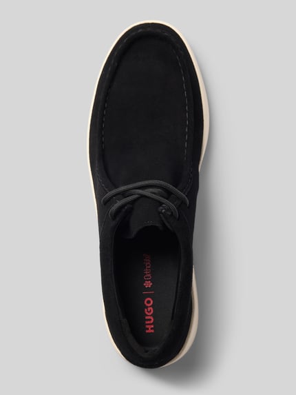 Produktfoto, czarne buty sznurowane z naturalnej skóry model 'Lyde_derb_sd' od HUGO, matowa faktura, biała podeszwa