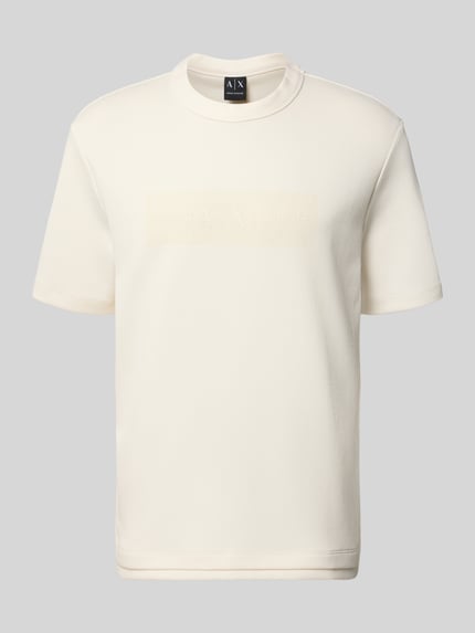 Produktfoto, T-Shirt mit Logo und Rundhalsausschnitt von ARMANI EXCHANGE, bawełna, krój regular fit, logo, kolor kremowy, długość pleców w rozmiarze M: 71 cm