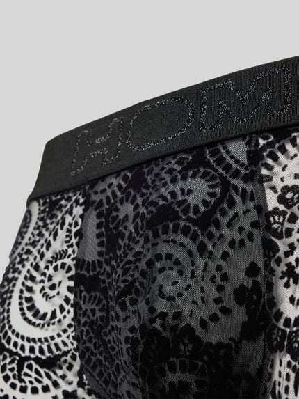 Produktfoto, Slim Fit Trunks in semitransparentem Design Modell 'Rhapsody' von HOM, schwarzes Spitzenmuster, elastischer Material-Mix, Logo-Detail