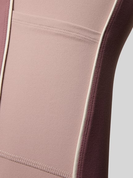 Produktfoto, Slim Fit Leggins mit elastischem Bund Modell 'MALBON' von Fabletics, Damen Leggins in Rosatönen, glatte Struktur, Detailaufnahme