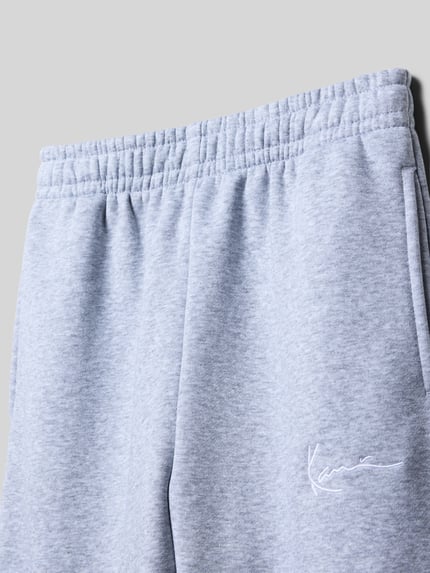 Karl Kani Regular fit sweatpants met logostitching Middengrijs gemêleerd - 2