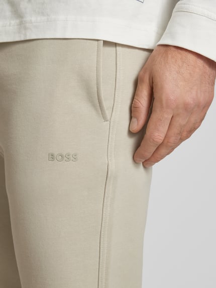 BOSS Orange Spodnie dresowe o kroju regular fit z tunelem model ‘SeChup’ Beżowy 3