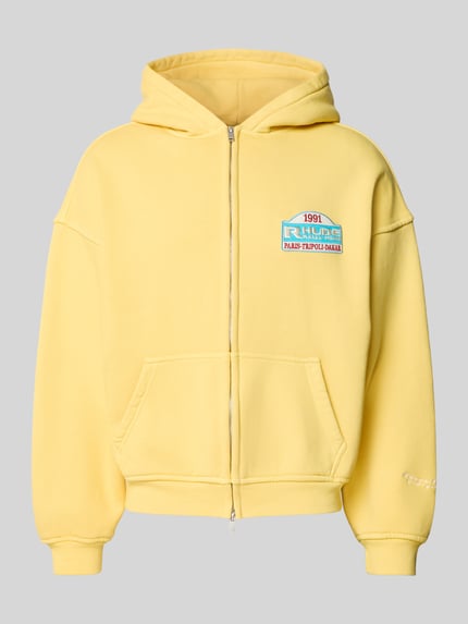 Produktfoto, Sweatjacke aus reiner Baumwolle von RHUDE w kolorze żółtym, krój relaxed fit, kaptur, kieszeń kangurka, zamek błyskawiczny dwustronny, Długość tyłu w rozmiarze M: 60 cm, Szerokość w rozmiarze M: 64 cm, Długość rękawów w rozmiarze M: 54 cm