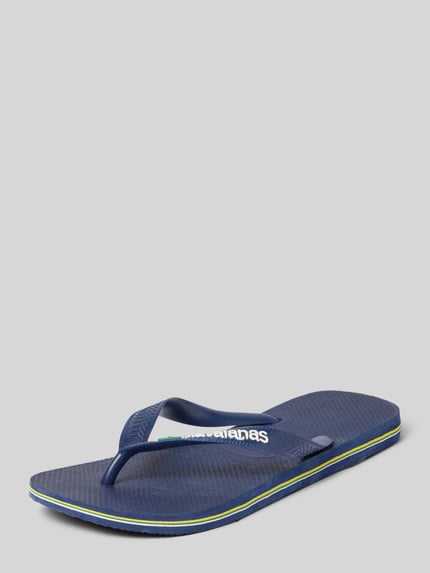 Produktfoto, Slippers mit Logo-Detail Modell 'Brasil' von Havaianas, detal z logo, zaokrąglony krój, otwarta pięta, wysokość obcasa: 2 cm, wysokość cholewki: 7 cm, kolor granatowy, faktura teksturowana