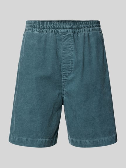 Produktfoto, Jeansshorts mit elastischem Bund Modell 'Reynold' von Carhartt Work In Progress, reine Baumwolle, relaxed Fit, blaugrüne Farbe, strukturierte Oberfläche, Vorderansicht.