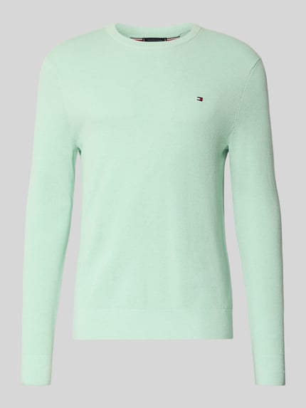 Produktfoto, Regular Fit Strickpullover aus reiner Baumwolle von Tommy Hilfiger in Optik: Unifarben, Strickoptik, Logo-Detail, Rundhals, Langarm, Ärmelabschluss gerippt, Rumpfabschluss gerippt, Materialverarbeitung: Strick, Farbe mintgrün
