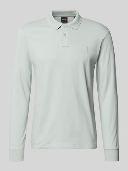 Productfoto, lichtgroen slim fit poloshirt uit katoenmix met label stitching en polokraag, model 'PASSERBY' van BOSS Orange