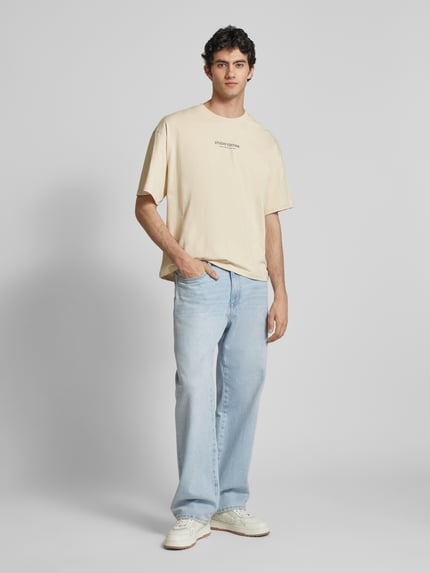 Alpha Industries T-shirt z nadrukiem z logo model ‘Studio Edition’ Złamany biały 1