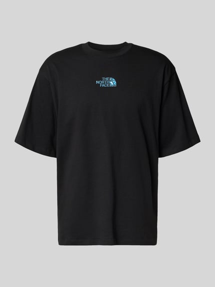 Produktfoto, Oversized T-Shirt mit Logo und Rundhalsausschnitt von The North Face, czarna bawełna, nadruk z logo, długość tyłu w rozmiarze M: 73 cm