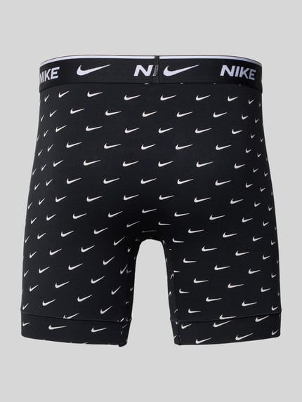 Productfoto, Trunks met logo-opschrift model 'E-DAY' van Nike, nauwsluitende fit, elastische tailleband, labelprint, zwart met wit