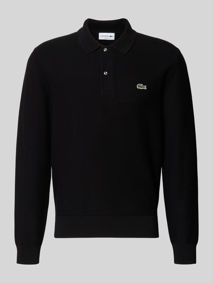 Produktfoto, czarna koszulka polo Regular Fit Poloshirt aus reiner Baumwolle von Lacoste, gładka faktura, kontekst: Herren Poloshirt von Lacoste