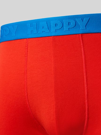 Männermodel trägt Boxershorts mit elastischem Logo-Bund im 3er-Pack von Happy Socks, Baumwoll-Elasthan-Mix, Nahaufnahme Oberkörper.